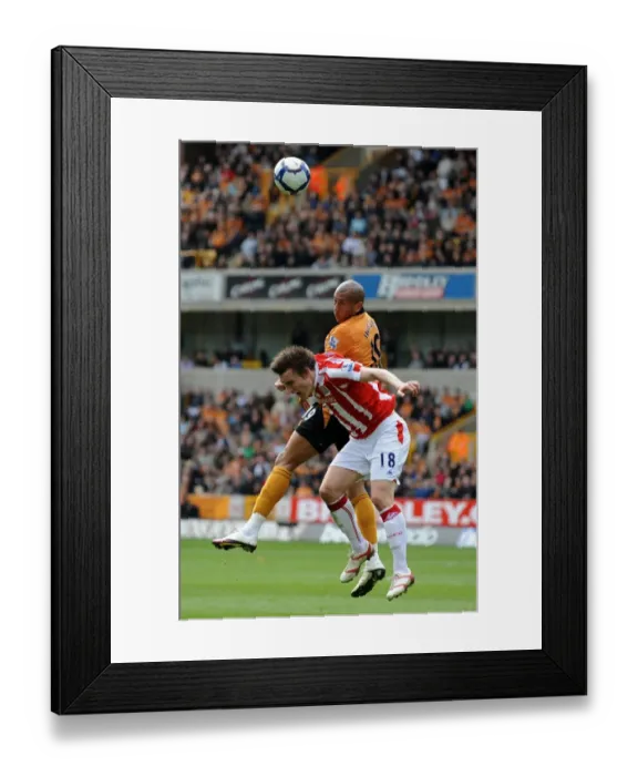 Framed Print : Wolverhampton Wanderers vs Stoke City Showdown: Iwelumo vs Whitehead (April 11, 2010) - Premier League Battle