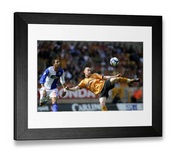 Framed Print : David Jones vs. Steven Nzonzi: Intense Battle in Wolverhampton Wanderers vs. Blackburn Rovers Premier League Clash Framed Print : David Jones vs. Steven Nzonzi: Intense Battle in Wolverhampton Wanderers vs. Blackburn Rovers Premier League Clash