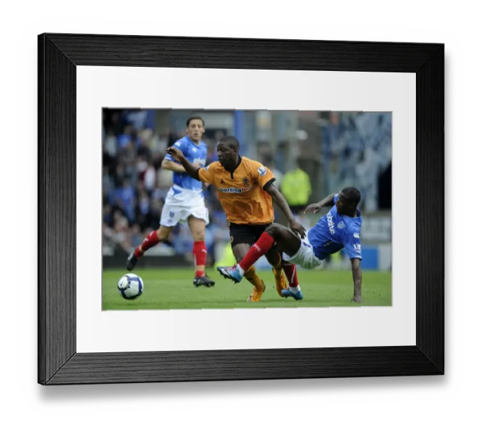 Framed Print : Mujangi Bia vs. Mokoena: A Battle in the Barclays Premier League - Portsmouth vs. Wolverhampton Wanderers Framed Print : Mujangi Bia vs. Mokoena: A Battle in the Barclays Premier League - Portsmouth vs. Wolverhampton Wanderers