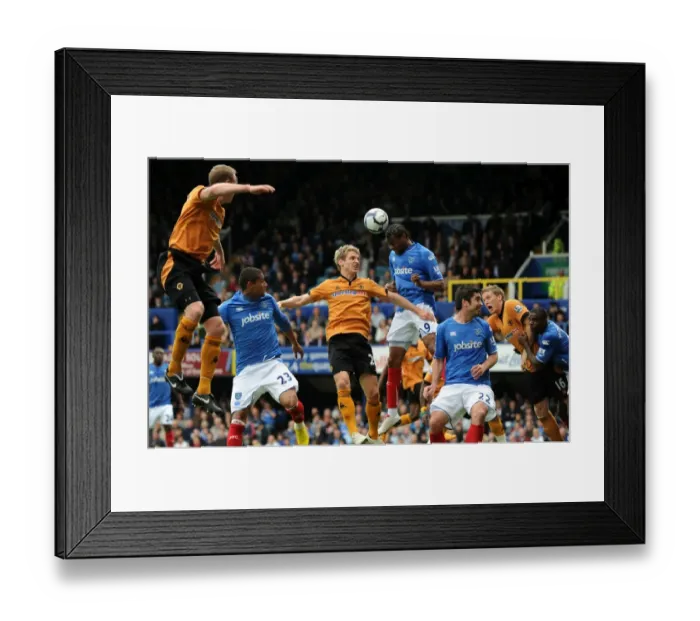 Framed Print : Clash of Titans: Kevin Doyle vs Frederic Piquionne - Wolverhampton Wanderers vs Portsmouth, Barclays Premier League Framed Print : Clash of Titans: Kevin Doyle vs Frederic Piquionne - Wolverhampton Wanderers vs Portsmouth, Barclays Premier League