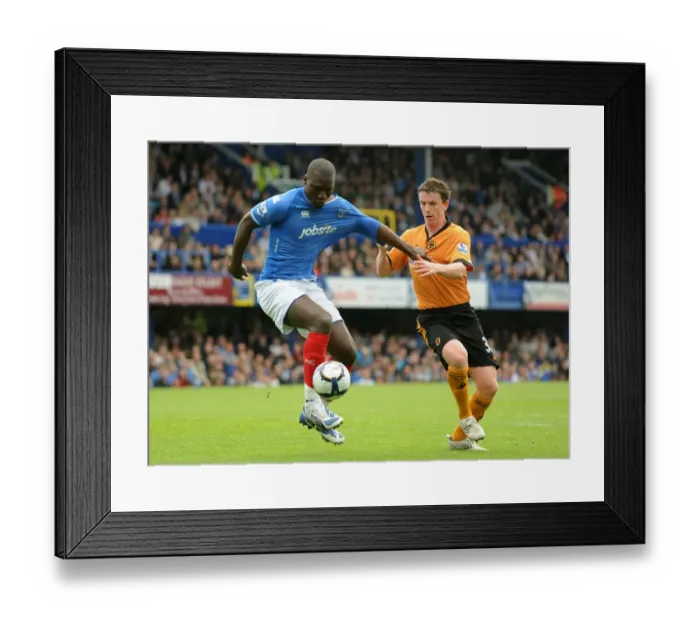 Framed Print : Clash of Titans: Diop vs. Foley - Premier League Battle