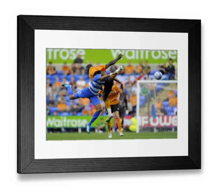 Framed Print : Clash of Forces: Jimmy Kebe vs. George Elokobi in the Reading vs. Wolverhampton Wanderers Pre-Season Friendly Framed Print : Clash of Forces: Jimmy Kebe vs. George Elokobi in the Reading vs. Wolverhampton Wanderers Pre-Season Friendly