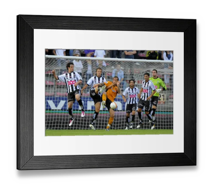 Framed Print : Wolverhampton Wanderers Stephen Fletcher Outsmarts Charleroi Defenders in Pre-Season Clash Framed Print : Wolverhampton Wanderers Stephen Fletcher Outsmarts Charleroi Defenders in Pre-Season Clash