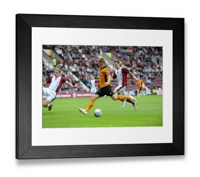 Framed Print : Wolverhampton Wanderers Kevin Doyle: Pursuing Victory - Pre-season Friendly vs Heart of Midlothian: Aiming for the Winning Goal Framed Print : Wolverhampton Wanderers Kevin Doyle: Pursuing Victory - Pre-season Friendly vs Heart of Midlothian: Aiming for the Winning Goal