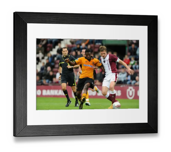 Framed Print : Mujanji Bia vs Zaliukas: Wolverhampton Wanderers vs Heart of Midlothian Pre-Season Clash Framed Print : Mujanji Bia vs Zaliukas: Wolverhampton Wanderers vs Heart of Midlothian Pre-Season Clash