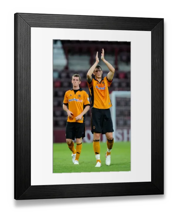 Framed Print : Wolverhampton Wanderers Greg Halford and Kevin Foley Salute Fans in Heart of Midlothian Friendly Framed Print : Wolverhampton Wanderers Greg Halford and Kevin Foley Salute Fans in Heart of Midlothian Friendly