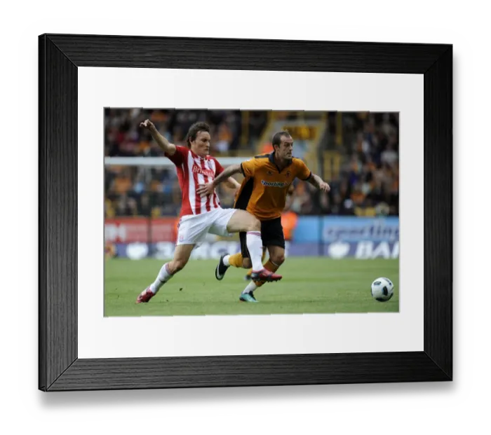 Framed Print : Steven Fletcher vs. Dean Whitehead: A Battle in the Barclays Premier League - Wolverhampton Wanderers vs. Stoke City: Intense Rivalry on the Field Framed Print : Steven Fletcher vs. Dean Whitehead: A Battle in the Barclays Premier League - Wolverhampton Wanderers vs. Stoke City: Intense Rivalry on the Field