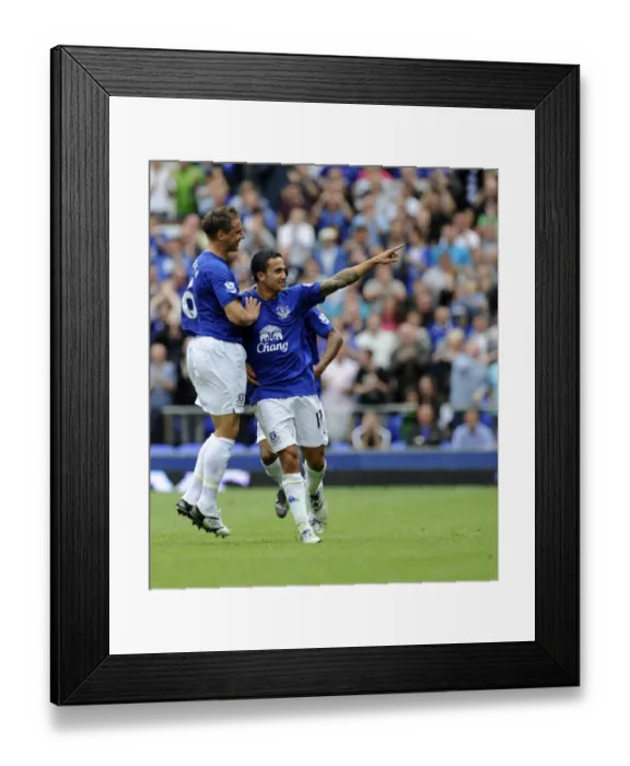 Framed Print : Tim Cahill's Stunner: Everton Takes 1-0 Lead Over Wolverhampton Wanderers in Barclays League Clash Framed Print : Tim Cahill's Stunner: Everton Takes 1-0 Lead Over Wolverhampton Wanderers in Barclays League Clash