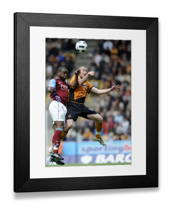 Framed Print : Clash of the Midfield Titans: David Jones vs Nigel Reo-Coker - Wolverhampton Wanderers vs Aston Villa, Barclays Premier League Framed Print : Clash of the Midfield Titans: David Jones vs Nigel Reo-Coker - Wolverhampton Wanderers vs Aston Villa, Barclays Premier League