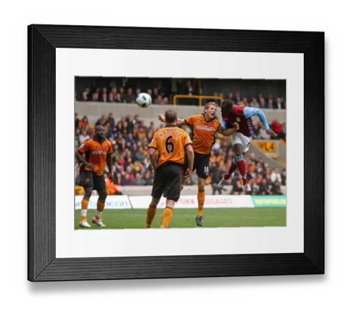 Framed Print : Emile Heskey's Game-Winning Goal: Aston Villa Defeats Wolverhampton Wanderers in Premier League (1-2)