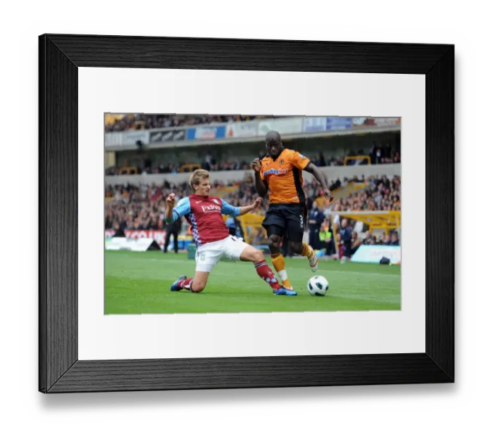 Framed Print : Clash of the Midland Rivals: Elokobi vs. Albrighton in Wolverhampton Wanderers vs. Aston Villa (BPL) Framed Print : Clash of the Midland Rivals: Elokobi vs. Albrighton in Wolverhampton Wanderers vs. Aston Villa (BPL)