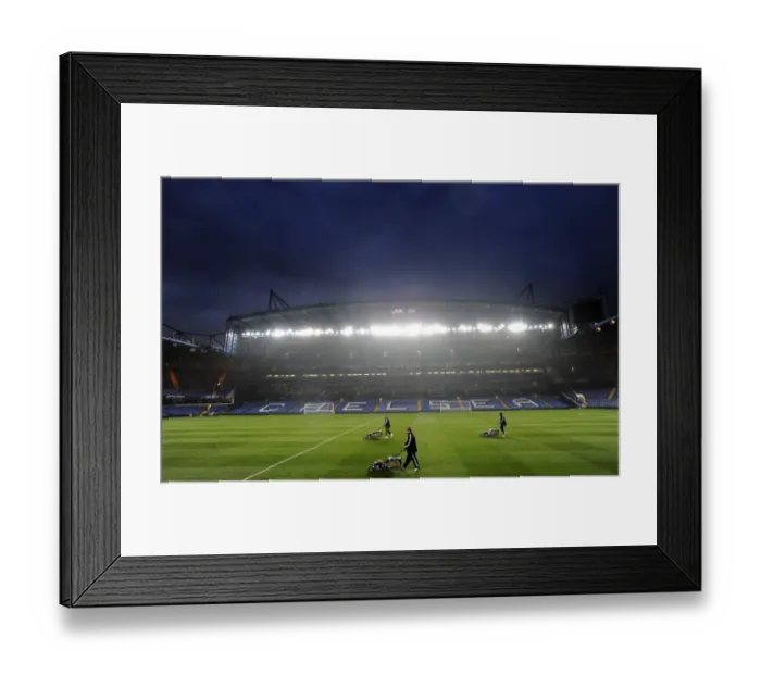 Framed Print : Preparing the Turf: Groundskeepers Ready Stamford Bridge for Wolves Premier League Battle Framed Print : Preparing the Turf: Groundskeepers Ready Stamford Bridge for Wolves Premier League Battle