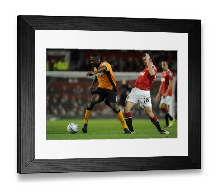 Framed Print : Sylvan Ebanks-Blake vs Darron Gibson: A Clash in the Carling Cup: Manchester United vs Wolverhampton Wanderers