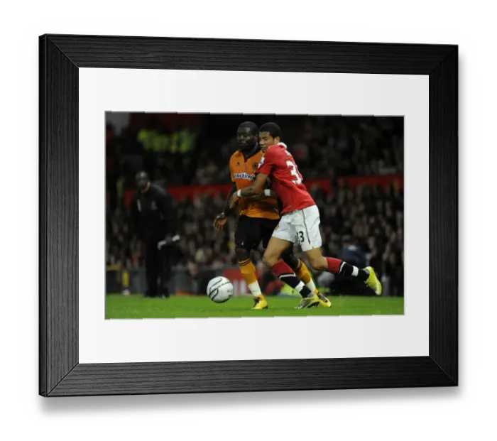 Framed Print : Clash of the Titans: Bebe vs. Elokobi - Manchester United vs. Wolverhampton Wanderers in Carling Cup Round Four Framed Print : Clash of the Titans: Bebe vs. Elokobi - Manchester United vs. Wolverhampton Wanderers in Carling Cup Round Four