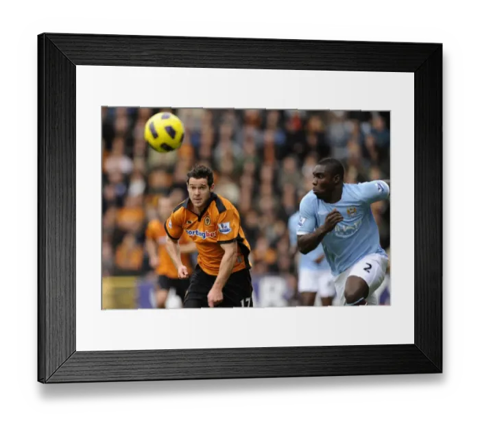 Framed Print : Clash of Titans: Jarvis vs. Richards in Wolverhampton Wanderers vs Manchester City, Barclays Premier League