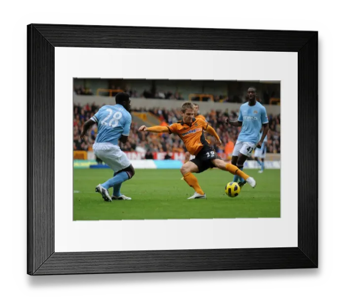 Framed Print : Wolverhampton Wanderers vs Manchester City: A Battle Between Kevin Doyle and Kolo Toure in the Premier League Framed Print : Wolverhampton Wanderers vs Manchester City: A Battle Between Kevin Doyle and Kolo Toure in the Premier League
