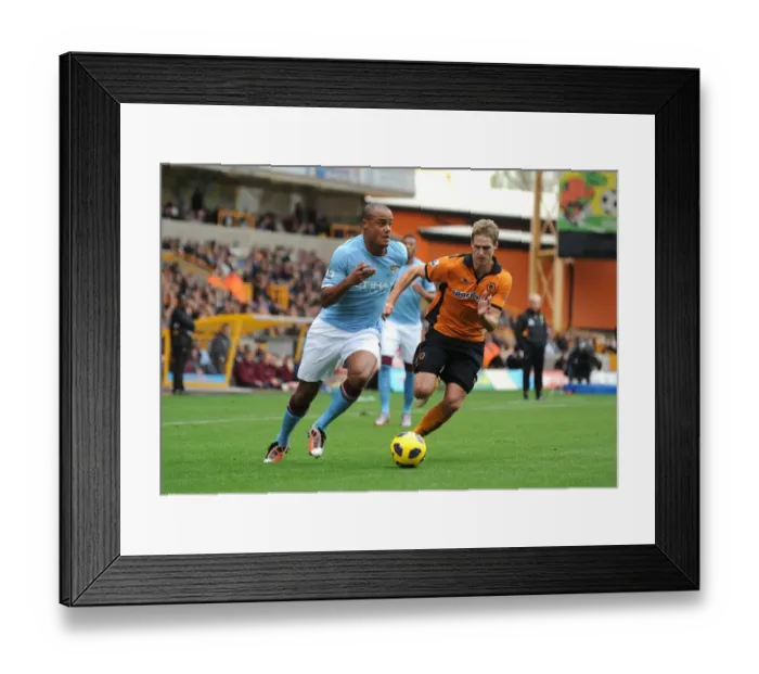 Framed Print : Kompany vs Edwards: A Premier League Showdown - Wolverhampton Wanderers vs Manchester City Framed Print : Kompany vs Edwards: A Premier League Showdown - Wolverhampton Wanderers vs Manchester City