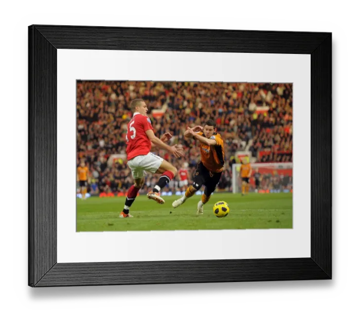 Framed Print : A Clash of Titans: Nemanja Vidic vs. Matthew Jarvis - Manchester United vs. Wolverhampton Wanderers (Premier League Soccer) Framed Print : A Clash of Titans: Nemanja Vidic vs. Matthew Jarvis - Manchester United vs. Wolverhampton Wanderers (Premier League Soccer)