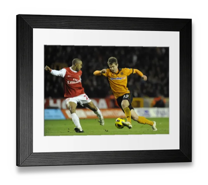 Framed Print : Wolverhampton Wanderers vs Arsenal: Intense Encounter between Kevin Doyle and Gael Clichy in the Premier League Framed Print : Wolverhampton Wanderers vs Arsenal: Intense Encounter between Kevin Doyle and Gael Clichy in the Premier League
