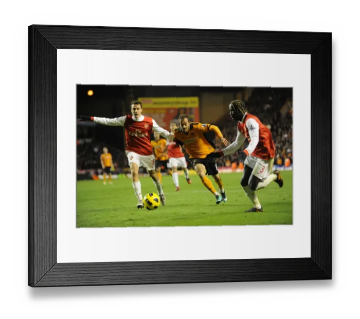 Framed Print : Wolverhampton Wanderers vs Arsenal: Steven Fletcher's Intense Battle with Squillaci and Sagna Framed Print : Wolverhampton Wanderers vs Arsenal: Steven Fletcher's Intense Battle with Squillaci and Sagna