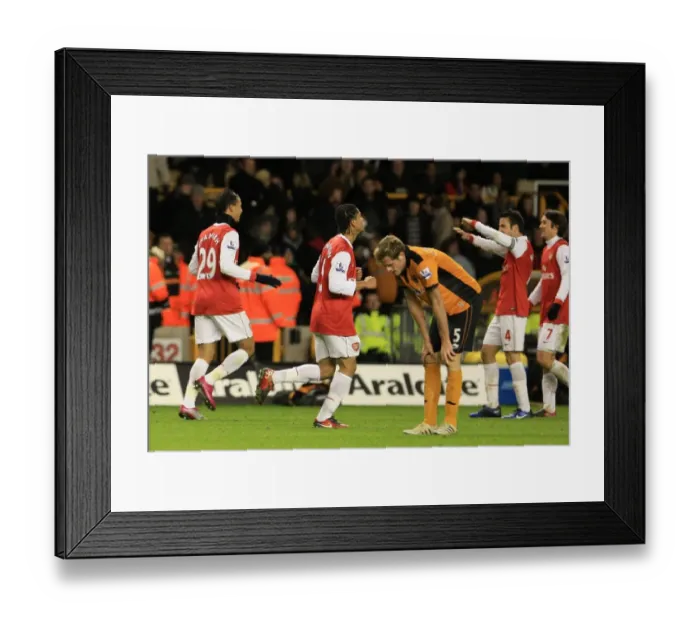 Framed Print : Wolverhampton Wanderers 0-2 Arsenal: Dejected Stearman Amid Chamakh's Celebration Framed Print : Wolverhampton Wanderers 0-2 Arsenal: Dejected Stearman Amid Chamakh's Celebration