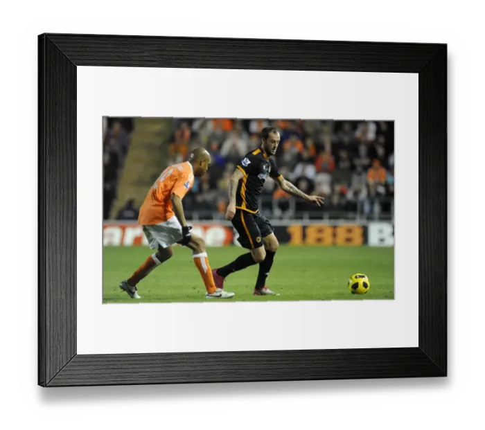 Framed Print : Wolverhampton Wanderers vs Blackpool: Steven Fletcher vs Ludovic Sylvestre - A Premier League Showdown Framed Print : Wolverhampton Wanderers vs Blackpool: Steven Fletcher vs Ludovic Sylvestre - A Premier League Showdown