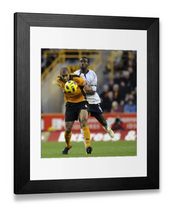 Framed Print : Clash of Titans: Wolves vs. Bolton - Premier League Soccer Showdown: Henry vs. Muamba