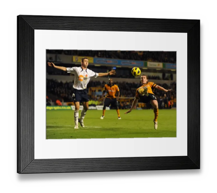 Framed Print : Clash of the Titans: Kevin Foley vs Gary Cahill - A Premier League Battle between Wolverhampton Wanderers and Bolton Wanderers