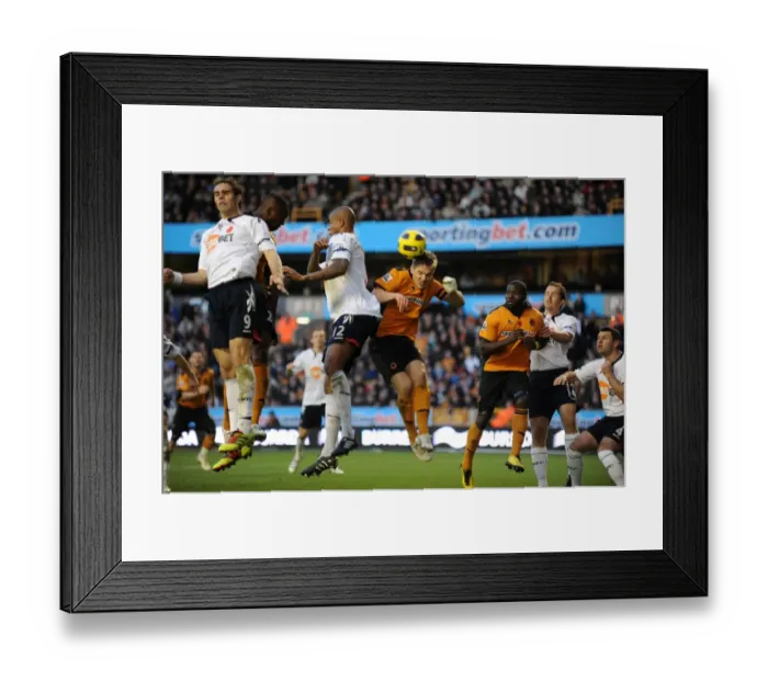 Framed Print : Thrilling Action: Kevin Doyle vs. Bolton Wanderers in Wolverhampton Wanderers Barclays Premier League Clash Framed Print : Thrilling Action: Kevin Doyle vs. Bolton Wanderers in Wolverhampton Wanderers Barclays Premier League Clash