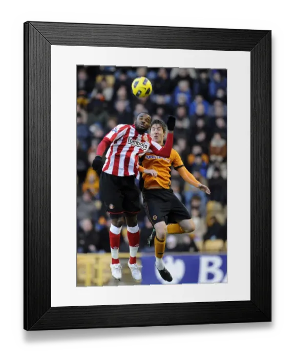 Framed Print : Clash of Stars: Darren Bent vs. Stephen Ward - Wolverhampton Wanderers vs. Sunderland in the Barclays Premier League Framed Print : Clash of Stars: Darren Bent vs. Stephen Ward - Wolverhampton Wanderers vs. Sunderland in the Barclays Premier League