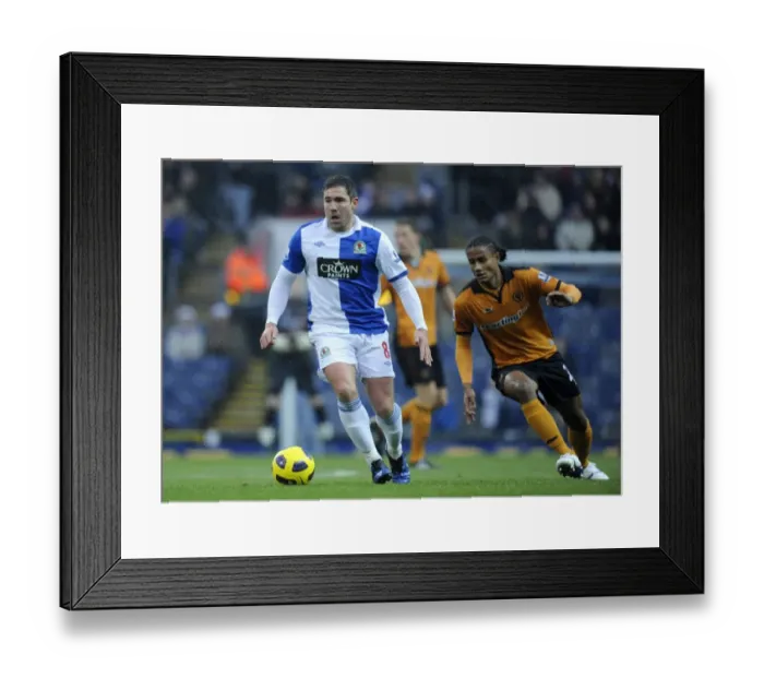 Framed Print : David Dunn vs. Michael Mancienne: A Battle in the Barclays League - Blackburn Rovers vs. Wolverhampton Wanderers: Two Football Giants Clash Framed Print : David Dunn vs. Michael Mancienne: A Battle in the Barclays League - Blackburn Rovers vs. Wolverhampton Wanderers: Two Football Giants Clash