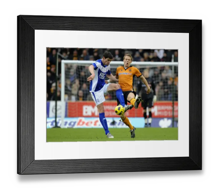 Framed Print : Wolverhampton Wanderers vs Birmingham City: A Fierce Encounter - Berra vs Zigic