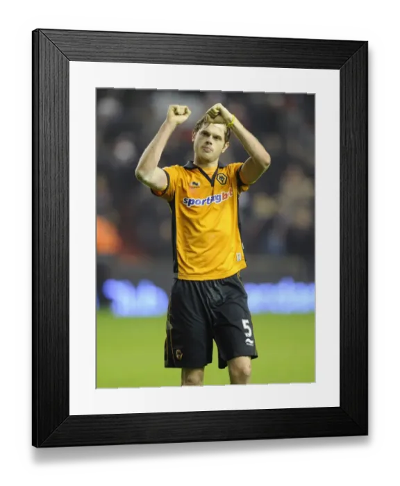 Framed Print : Wolverhampton Wanderers Richard Stearman: Celebrating a Historic Victory Against Liverpool in the Barclays Premier League