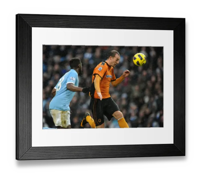 Framed Print : Steven Fletcher's Battle for Glory: Manchester City vs. Wolverhampton Wanderers in the Barclays Premier League Framed Print : Steven Fletcher's Battle for Glory: Manchester City vs. Wolverhampton Wanderers in the Barclays Premier League