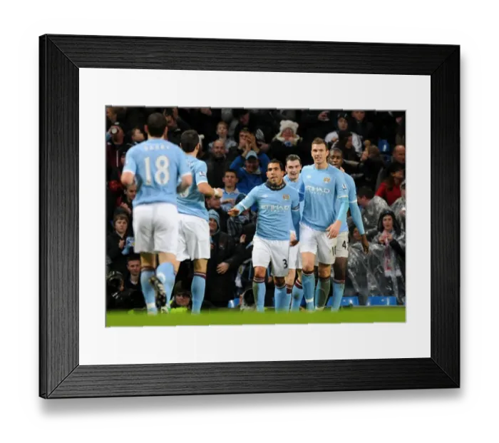 Framed Print : Carlos Tevez's Dramatic 2-1 Goal: Manchester City vs. Wolverhampton Wanderers Framed Print : Carlos Tevez's Dramatic 2-1 Goal: Manchester City vs. Wolverhampton Wanderers