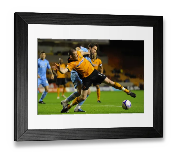 Framed Print : Wolverhampton Wanderers vs Doncaster Rovers: FA Cup Clash - David Jones vs Mark Wilson: A Battle at the Heart of the Field Framed Print : Wolverhampton Wanderers vs Doncaster Rovers: FA Cup Clash - David Jones vs Mark Wilson: A Battle at the Heart of the Field