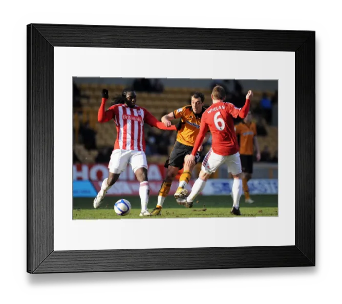 Framed Print : Wolverhampton Wanderers vs Stoke City: Nenad Milijas Stands Firm Against Kenwyne Jones and Glenn Whelan in FA Cup Round Four Framed Print : Wolverhampton Wanderers vs Stoke City: Nenad Milijas Stands Firm Against Kenwyne Jones and Glenn Whelan in FA Cup Round Four