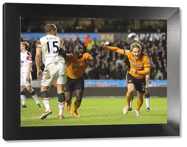 Wolverhampton Wanderers Glory Moment: Kevin Doyle and George Elokobi's Euphoric Celebration After Scoring 2-1 Against Manchester United (Premier League)