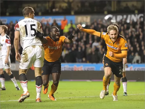 Wolverhampton Wanderers Glory Moment: Kevin Doyle and George Elokobi's Euphoric Celebration After Scoring 2-1 Against Manchester United (Premier League)