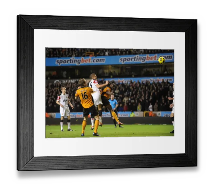 Framed Print : George Elokobi's Equalizer: Wolverhampton Wanderers vs Manchester United in Premier League Action Framed Print : George Elokobi's Equalizer: Wolverhampton Wanderers vs Manchester United in Premier League Action