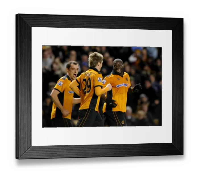 Framed Print : George Elokobi's Dramatic 2-1: Wolverhampton Wanderers Stun Manchester United in the Premier League