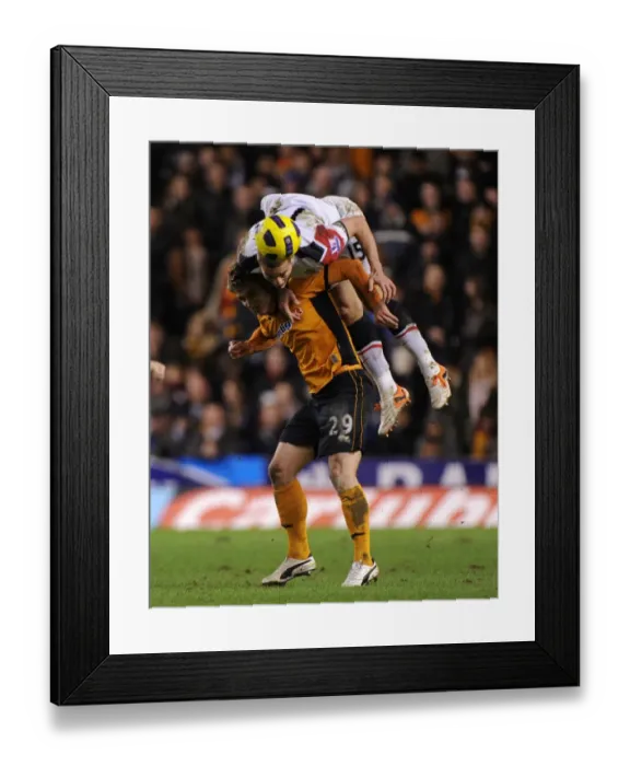 Framed Print : A Clash of Titans: Wolverhampton Wanderers vs Manchester United - Kevin Doyle vs Nemanja Vidic Framed Print : A Clash of Titans: Wolverhampton Wanderers vs Manchester United - Kevin Doyle vs Nemanja Vidic