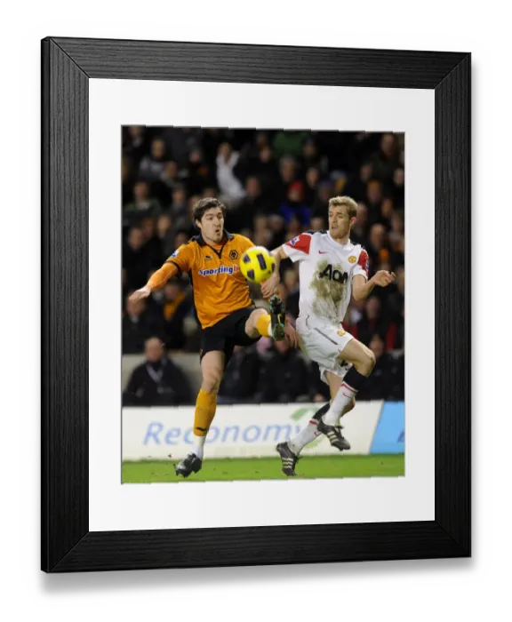 Framed Print : Wolverhampton Wanderers vs Manchester United: A Football Rivalry - A Head-to-Head Battle between Stephen Ward and Darren Fletcher
