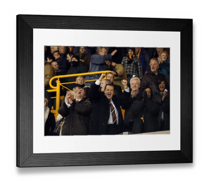 Framed Print : Jez Moxey's Euphoric Moment: Wolves Triumph Over Manchester United in the Premier League