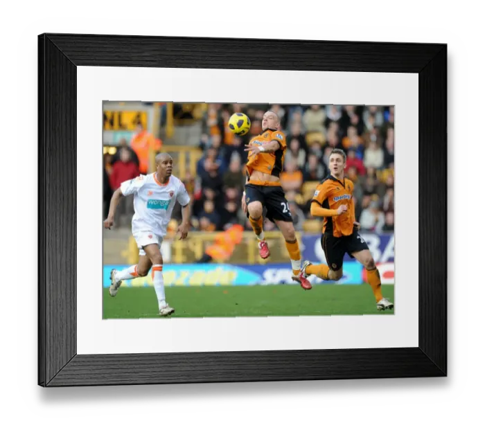 Framed Print : Wolverhampton Wanderers vs Blackpool: Jamie O'Hara and Kevin Doyle in Action - Barclays Premier League Soccer: Intense Moment between O'Hara and Doyle