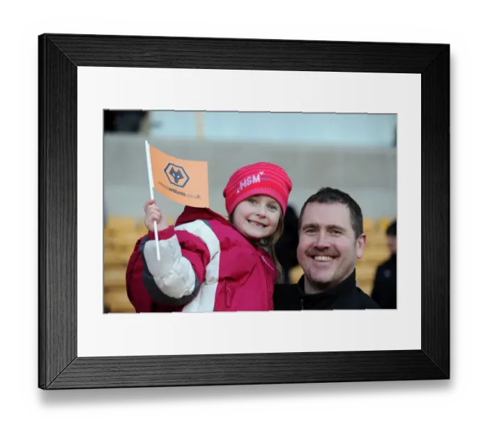 Framed Print : Jubilant Wolves Fans Celebrate Premier League Victory over Blackpool with Flag Wave at Molineux Stadium Framed Print : Jubilant Wolves Fans Celebrate Premier League Victory over Blackpool with Flag Wave at Molineux Stadium