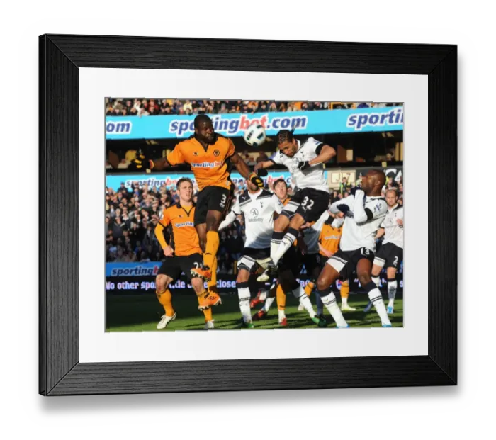Framed Print : George Elokobi Outmuscles Assou-Ekotto: Wolverhampton Wanderers Triumph Over Tottenham Hotspur in Premier League Framed Print : George Elokobi Outmuscles Assou-Ekotto: Wolverhampton Wanderers Triumph Over Tottenham Hotspur in Premier League