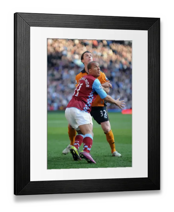 Framed Print : Agbonlahor vs. Foley: A Premier League Face-Off - Aston Villa vs. Wolverhampton Wanderers Framed Print : Agbonlahor vs. Foley: A Premier League Face-Off - Aston Villa vs. Wolverhampton Wanderers