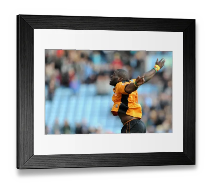 Framed Print : Wolverhampton Wanderers: George Elokobi Leads the Celebrations after Securing Victory over Aston Villa in the Premier League Framed Print : Wolverhampton Wanderers: George Elokobi Leads the Celebrations after Securing Victory over Aston Villa in the Premier League
