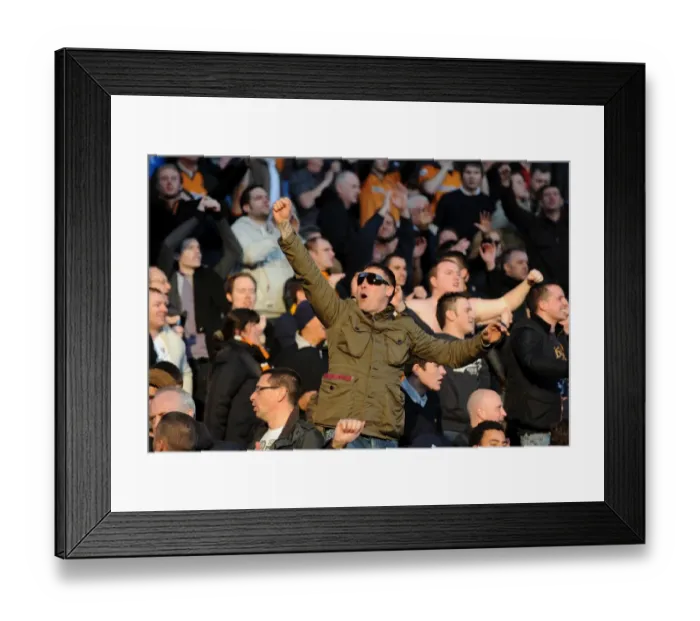 Framed Print : Euphoria Unleashed: Wolves Fans Celebrate Premier League Triumph Over Aston Villa Framed Print : Euphoria Unleashed: Wolves Fans Celebrate Premier League Triumph Over Aston Villa